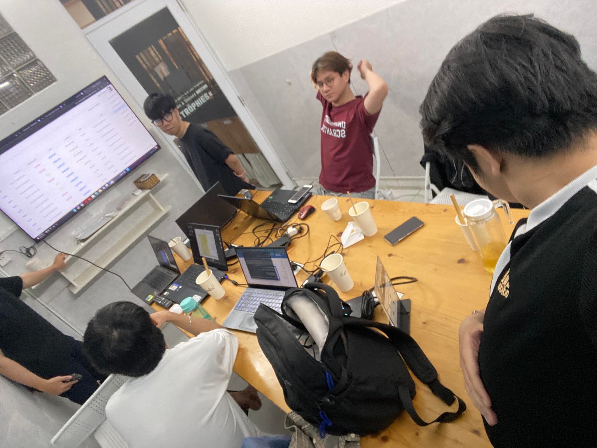 A group working together on a graduation project.