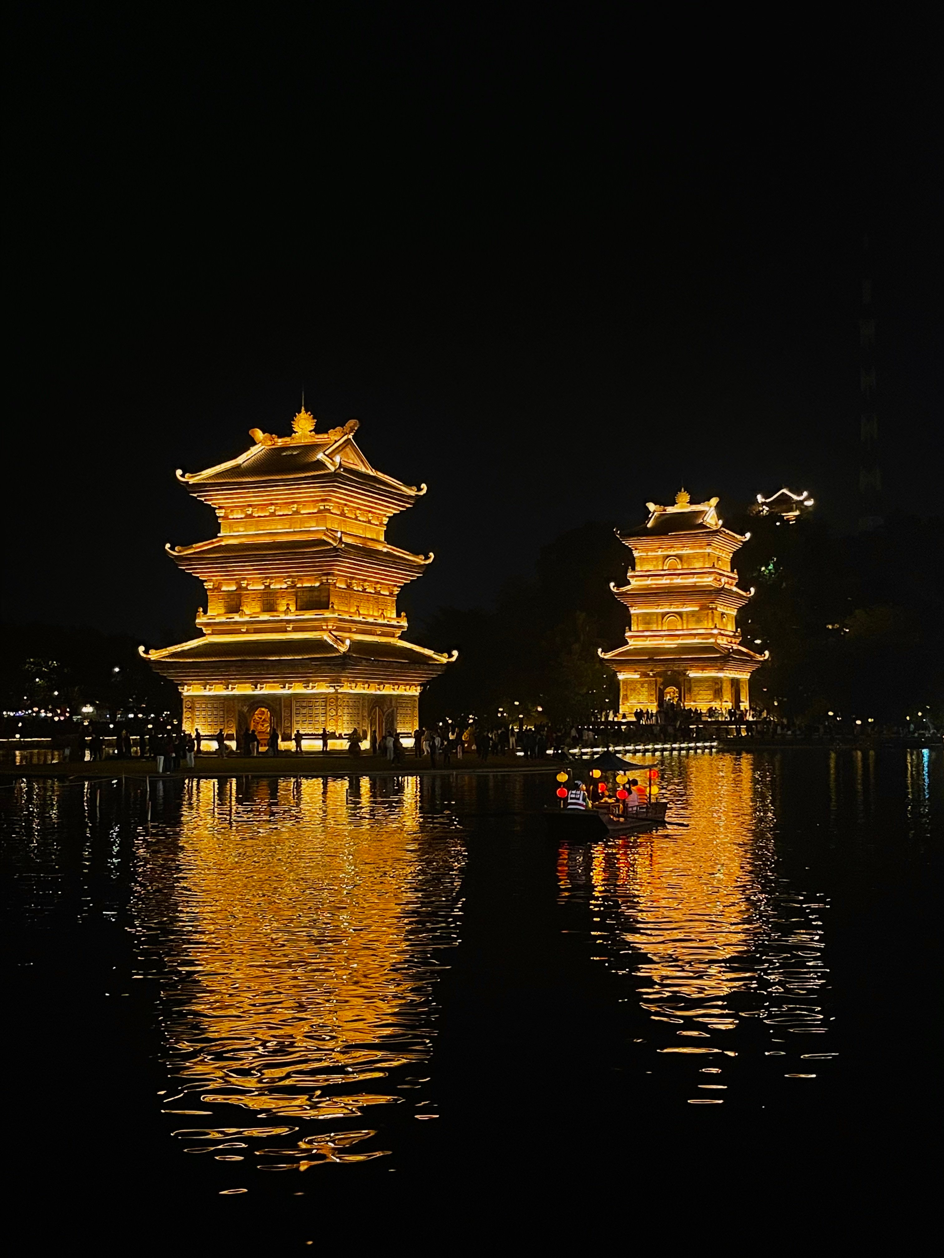 Two temples standing in a lake at Hoa Lư, Ninh Bình.